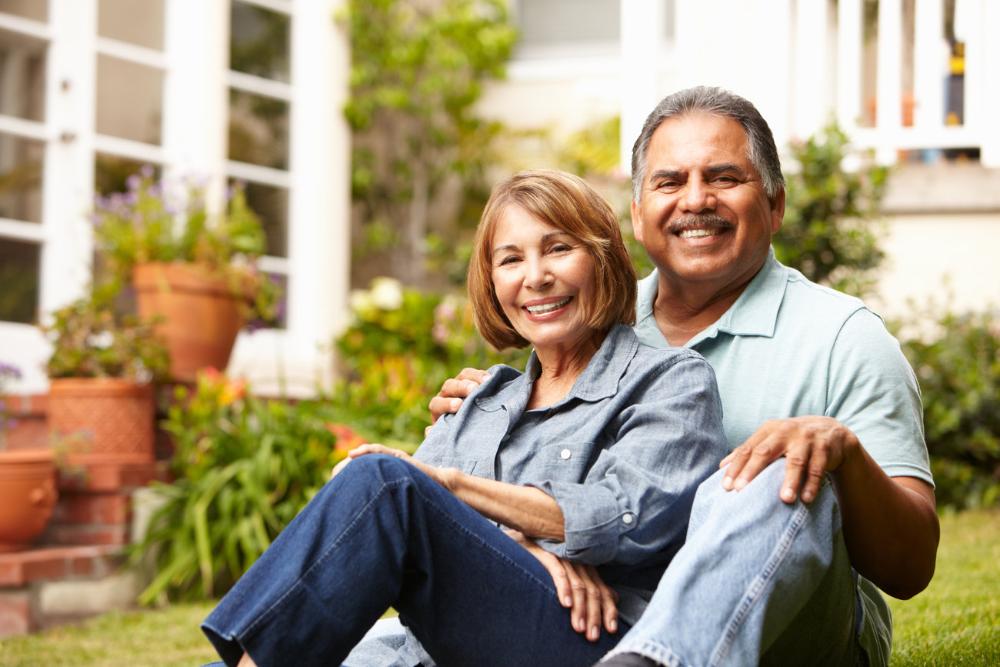middle- aged couples with dental implants in Birmingham, AL