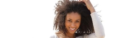 Lady smiling after getting clear aligners from Cook Family Dental