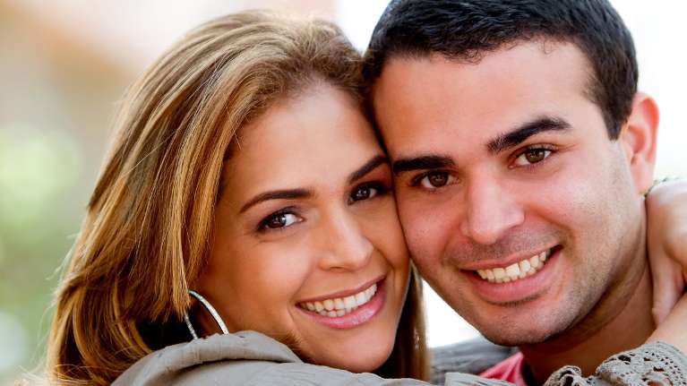 A smiling couple after Cosmetic Dentistry in Birmingham, AL