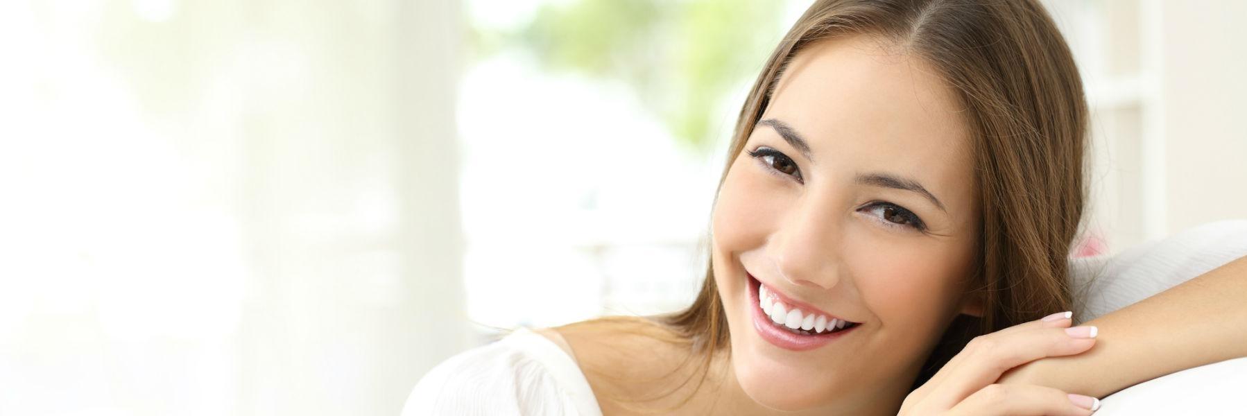 Woman with natural looking dental implant