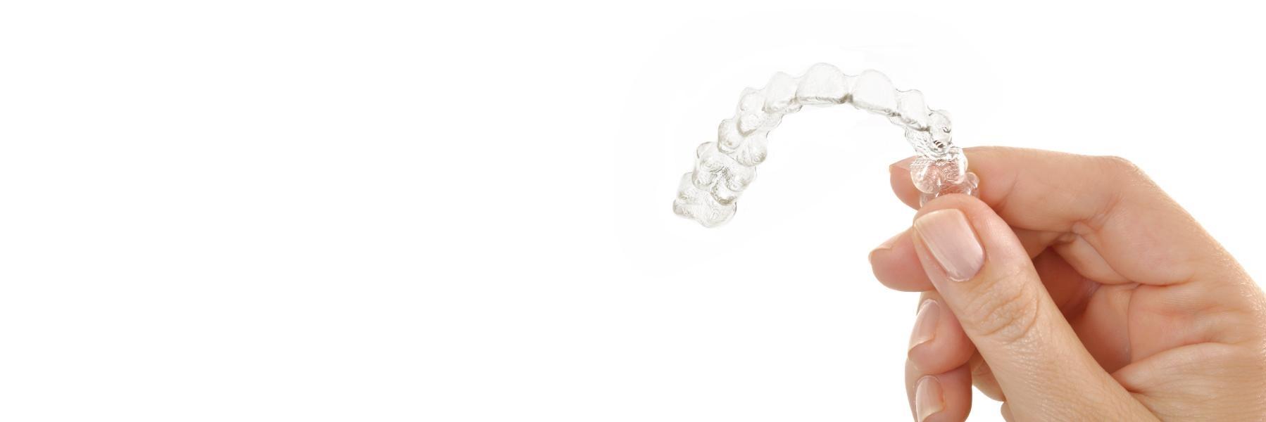 Hand holing Invisalign clear braces