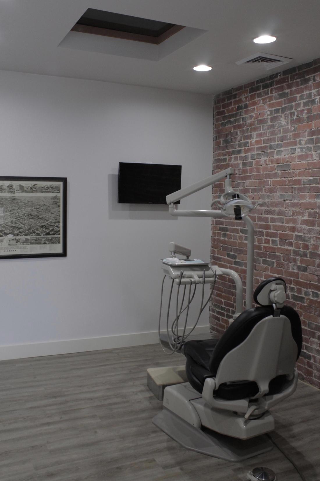 The Office Exam Room with a TV in Birmingham, AL at Cook Family Dental